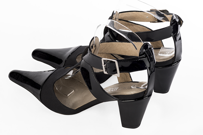 Gloss black women's open back T-strap shoes. Pointed toe. Medium cone heels. Rear view - Florence KOOIJMAN